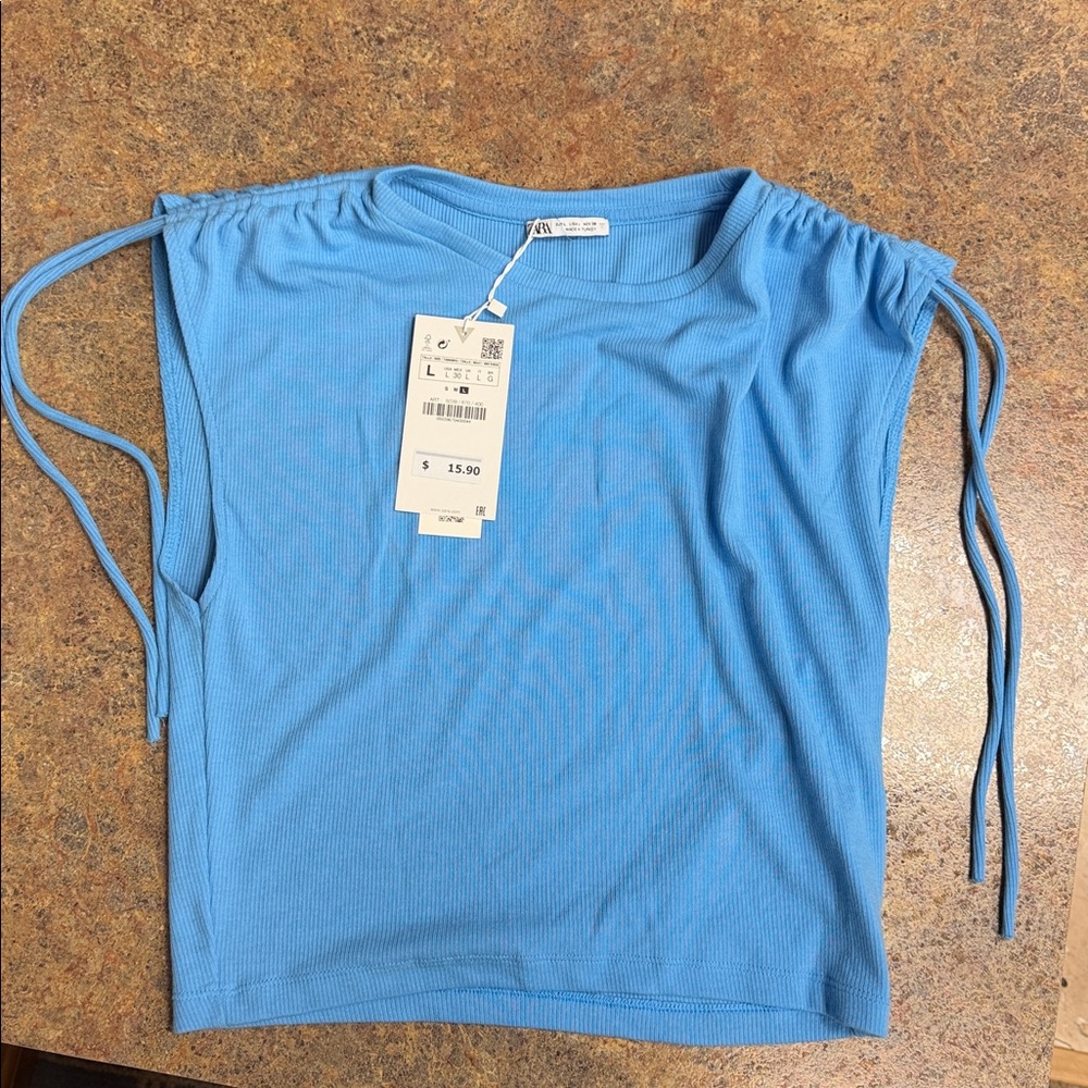 Blue Sleeveless Top with Drawstring Detail